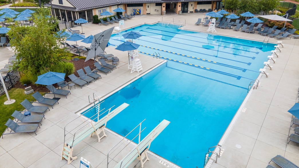 Chicago suburbs inground pool planning with custom concrete pool design and backyard layout