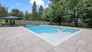 Pool Decking Showdown: Pavers vs Stamped Concrete vs Porcelain (Midwest All-Season Performance)